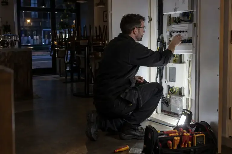 Out of hours electrician: a professional electrician assessing or carrying out the electrical work.